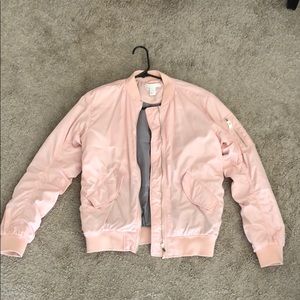 Blush nude bomber jacket with gold zippers